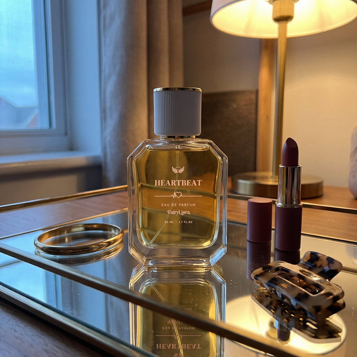 Heartbeat perfume on a mirrored vanity tray