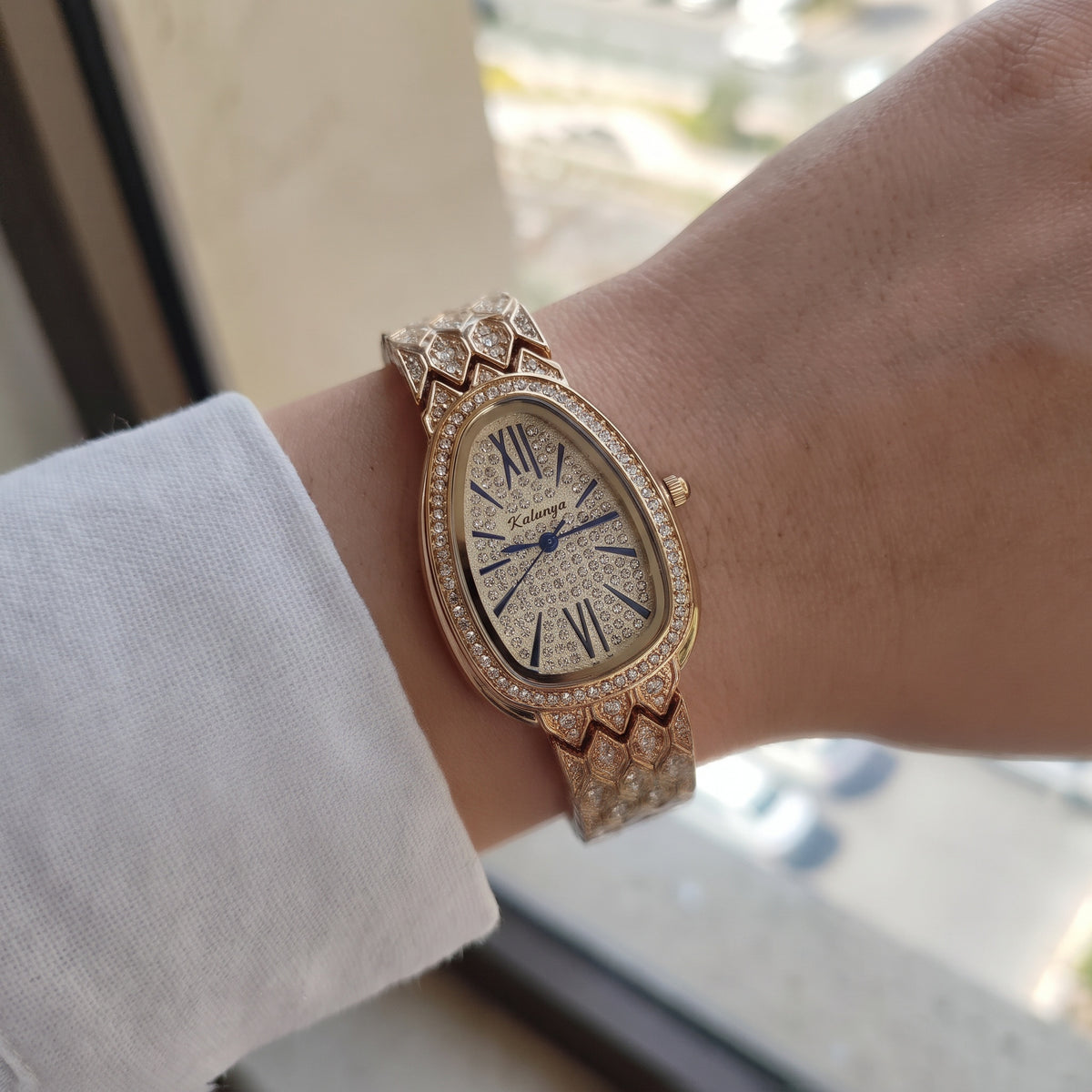 FairyLiora Empress Watch in Golden, crystal serpent bracelet, worn on the wrist