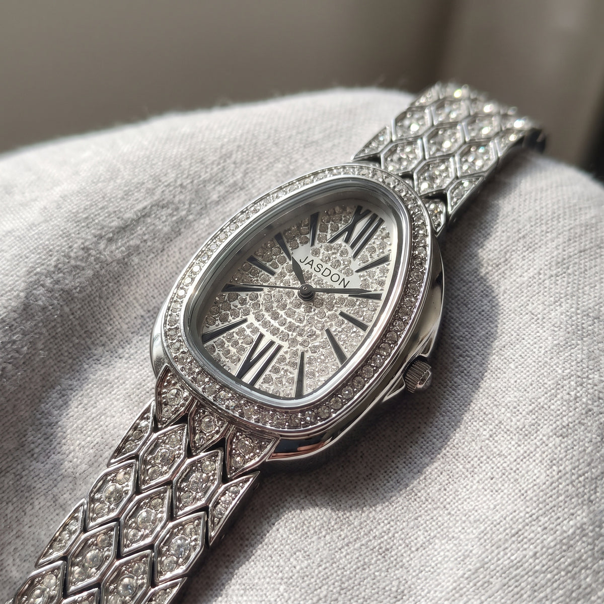 Empress Watch Silver: crystal-paved dial with black Roman numerals, close-up