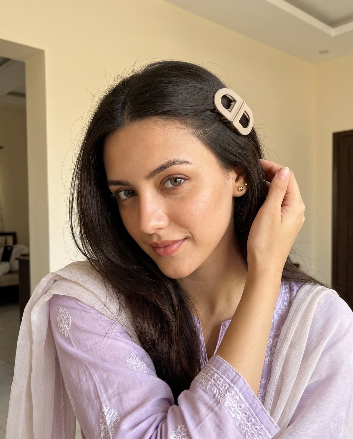 Taupe clip sweeping a front section back, lilac kurta