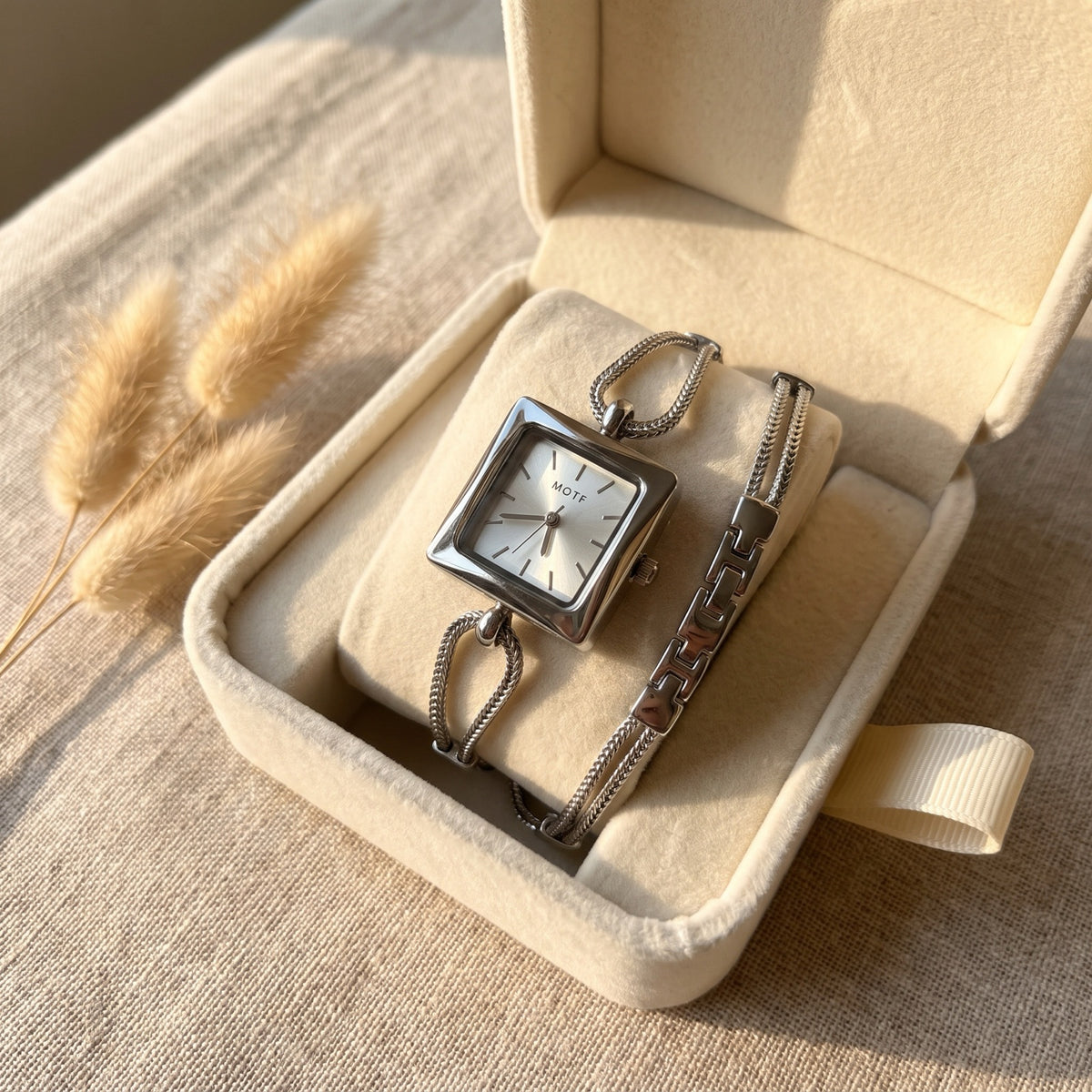 Queen's Watch in a cream velvet gift box