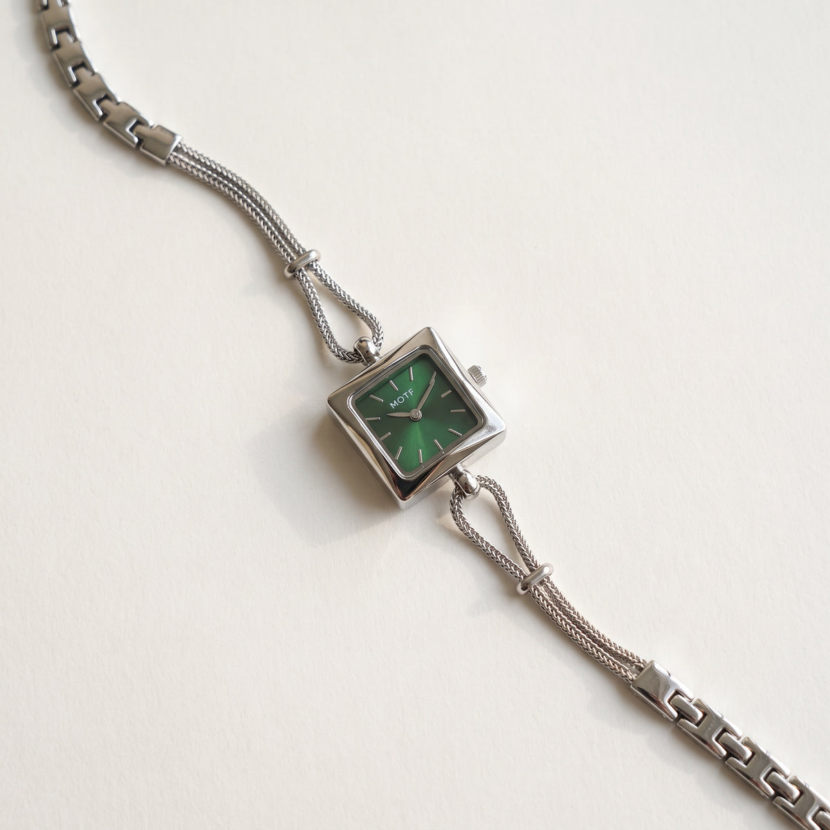 Queen's Watch in green, flat lay showing the full double chain and slider beads
