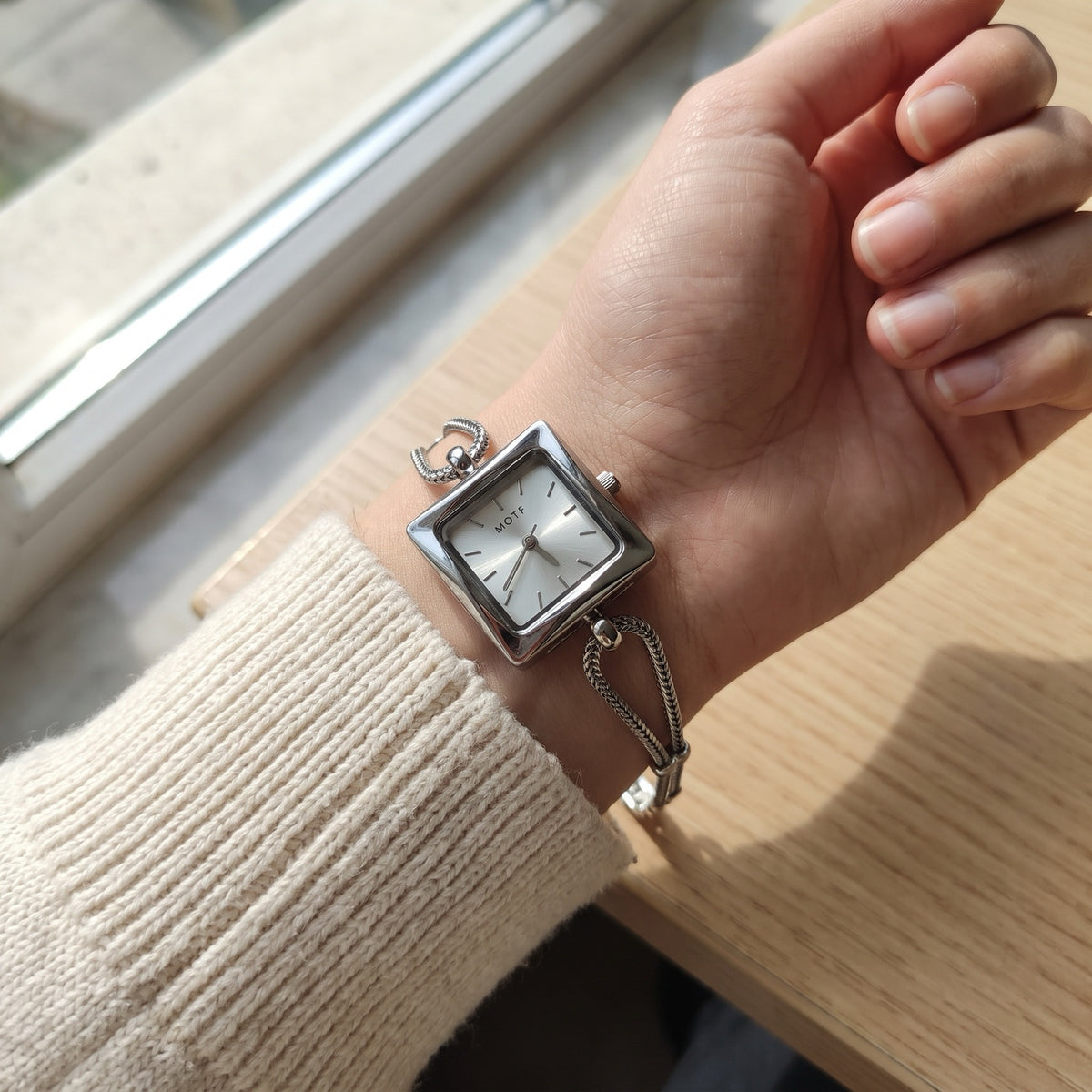 FairyLiora Queen's Watch, silver square case, worn on the wrist